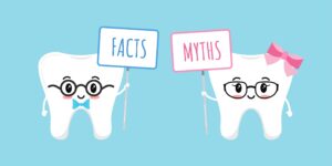 Illustration of 2 teeth holding signs reading "Facts" and "Myths" with a light blue background